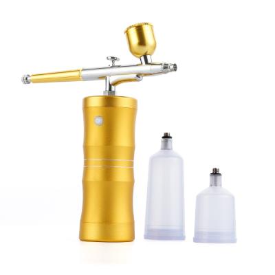 China Alloy Gold Airbrush Kit 25PSI Airbrush Aluminum Handheld Paint Set With Compressor Airbrush Spray Gun Moisturizing Oxygen Injector for sale