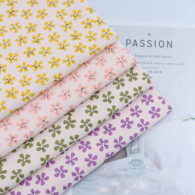 China Non conductive factory sells new floral flannel flower petal printing environmental friendly soft fabric women or children fabric for sale