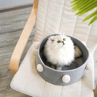 China Luxury Weaving Woven Breathable Cat Pompom Pet Bed Modern Cat Bed Cute Pet Round Nest for Four Seasons for sale