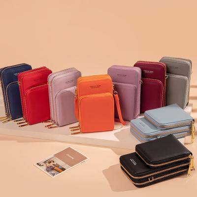 China 2021 Wholesale Korean Version Large Capacity PU Zipper Messenger Bag High Quality Mobile Phone Bag China PU Ladies Handbag for sale