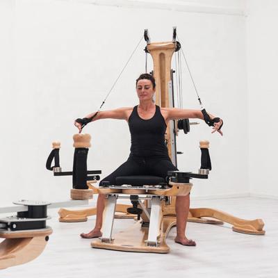 China Weight Lfiting CE Certification Pilates Pulley Tower Equipment Gyrotonic Machine For Body Exercise for sale