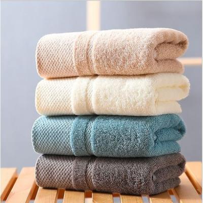 China Hot Sales Super Thick Thickened Non-linting Cotton 40 Absorbent Pure Strand Combed Face Towel And Bath Towel With Logo Custom for sale