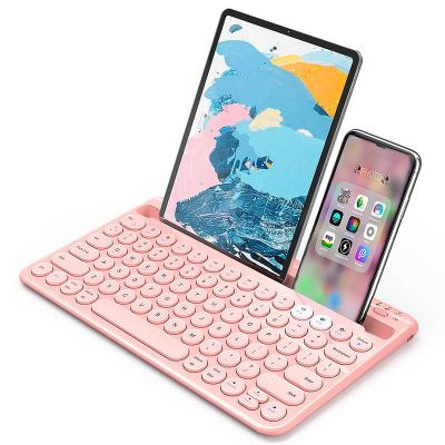 China BT Wireless Rechargeable Keyboard with Built-in Stand for iPad Tablet Smartphone Pink Wireless Keyboard for sale