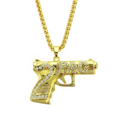 China Hiphop 14k Gold Plated Hip Hop Alloy Crystal Pendant Necklace Gun With Letter Pendant For Men for sale