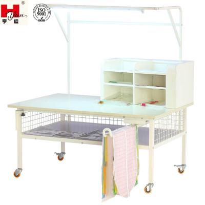 China Garment Shops Hot Sales Garment Factory Multifunctional Packing Table With Wheels for sale