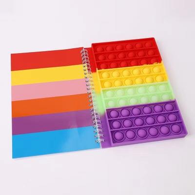 China 2022 New A5 Student Notebook Push Pop Silicone Decompression Toy Popper Bubble Cover Notebook Kids Eco-friendly Gift for sale