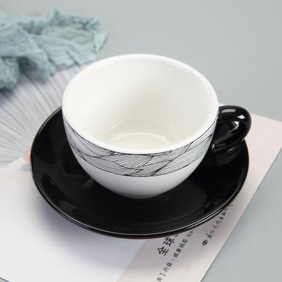 China 2021 Hot Sustainable Design Black And White Leaf Painting Ceramic Coffee Tea Cups And Saucers for sale