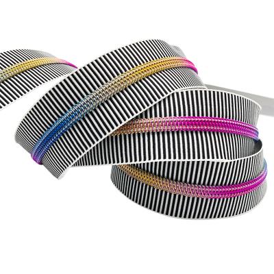 China Hot Sale #5 Jacquard Rainbow Coil Viable Nylon Zipper Tape New Design Jacquard Zipper Tape For Bags for sale