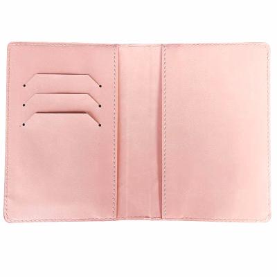 China Custom High Quality Embossed Leather NATIONAL Logo Travel PU Men Women Passport Holder for sale