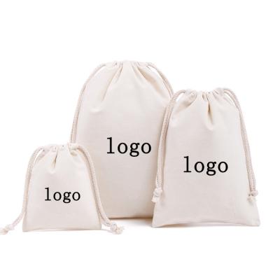 China Eco-friendly Customized Natural Logo Cotton Canvas Drawstring Bag Suction String Dust Storage Pouch Gift Bags for sale