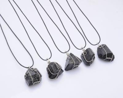 China Hot Sale Crystal Stone Pendant Necklace With Handmade Irregular Natural Black Tourmaline Chakra Raw Metal Woven for sale