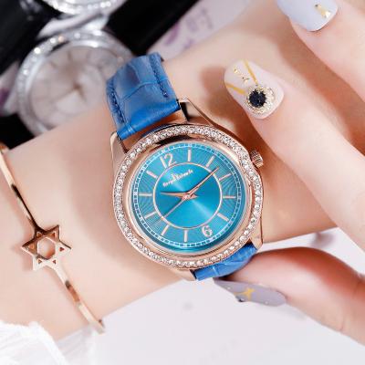 China Luxury Gold Alloy Case ODM Blue Leather Ladies Wrist Watch Water Resistant Pink Blue Watches Flat Quartz Women Watches for sale