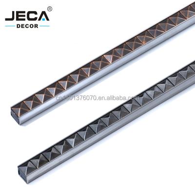 China Modern Luxury Foshan JECA Stainless Steel Tile Trim For Bathroom Or Kitchen Decoration 304 Ceramic Tile High Quality Trim With Diamond for sale