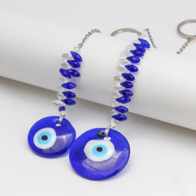 China 2021 Newest Metal Fashion Crystal Glass Round Eye Pendant Key Chain Blue Evil Eyes Key Chain For Car Ring for sale