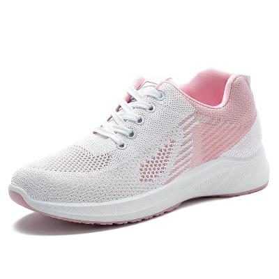 China Cushioning low price sneakers walking flat sports shoes for women fly weavn ladies sports shoes 2023 female soft running shoes for sale