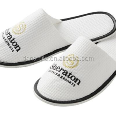 China Disposable Slippers Cheap Personalized Velvet Hotel Waffle Slippers for sale