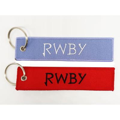 China Washable Luggage Pendant Professional Customized Double Sided Logo Embroidered Key Chain for sale