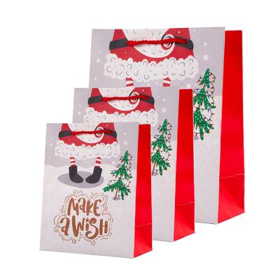 China Recyclable Recycled Red Festival Candy Chocolates Gift Bags Small Merry Christmas Paper Bag With Shinny Glitter for sale