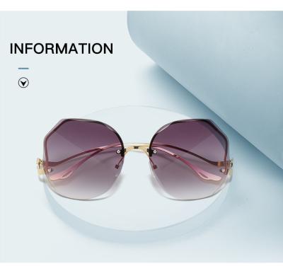 China Fashion Sunglasses 2021 Oversized Sunglasses Shades New Women Rimless Gradient Color Sunglasses Uv400 for sale