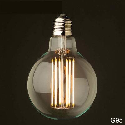 China 110 lm/w E26 E27 9W G125 G95 LED Filament Bulb with Dimmable Function and Amber Glass for sale