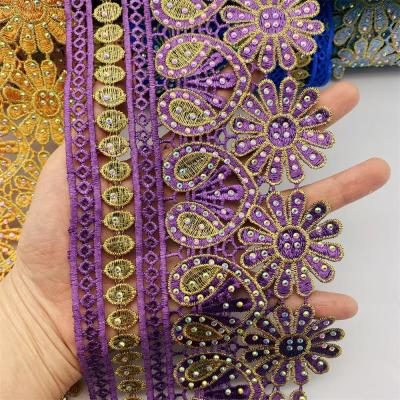 China Handmade Wholesale High Quality Colors African Lace Trim With Rhinestone Pattern Metallic Embroidered Nigeria Venice Lace Trim Wide 5.5cm for sale