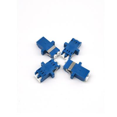 China FTTH PVC Duplex LC Adapter Blue Ceramic Singlemode Fiber Optic With Ear for sale