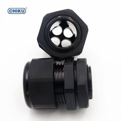 China Machinery control box and U/L etc. Recognized Multi-entry M32 IP68 Waterproof Nylon Cable Gland Multiple Cable Entry M32-4*9 for sale