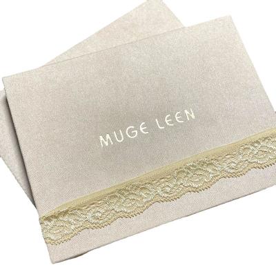 China EYE MUGE LEEN Dream Goddess Lace Book Eyeshadow Pearl Glitter Highlight to Blush 12 Color Eyeshadow Flat for sale