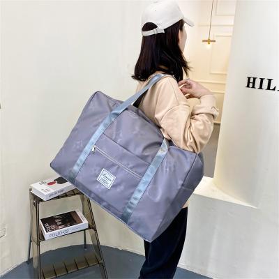 China 2022 Fashion Women's Large Capacity Short-distance Storage Bag Men's Travel Set Trolley Luggage Portable Lightweight Bag for sale