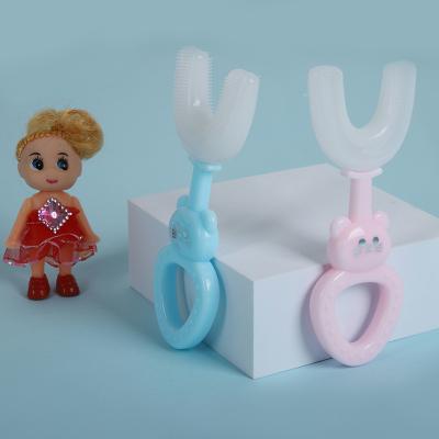 China Toy New Design 360 Children's U-shaped Toothbrush Baby Hair Silicone Soft Cartoon Soft Silicone Baby Brush for sale