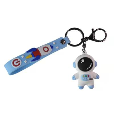 China Exquisite Eco-friendly Cartoon PVC Astronaut Pendant, Couples Car Pilot Leather Rope Key Chain for sale