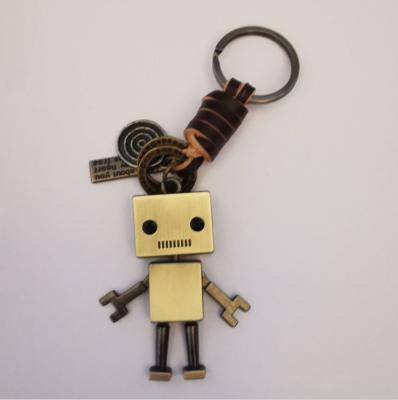 China Simple key chain cartoon cute robot whip key chain personality woven head pendant wholesale retro for sale