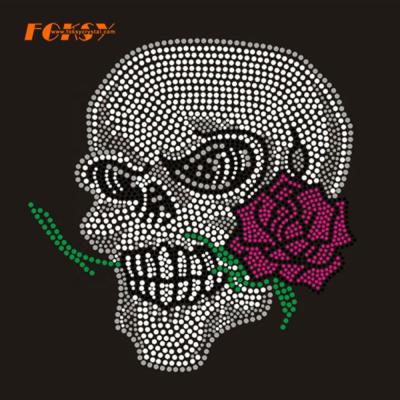 China Cool Flatback Skull Biting A Pink Iron On Rhinestone Transfer For Shirt for sale