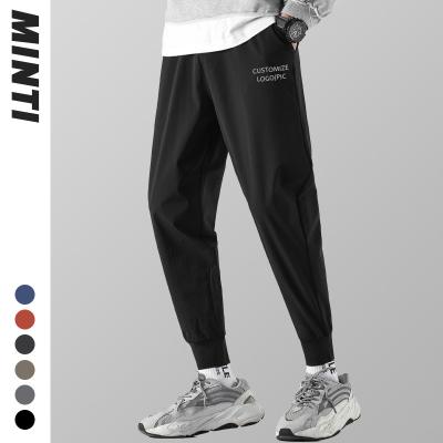 China Cheap custom made logo anti-pilling tapered fitness sports wear empty quick-drying unisex casual track men's gym pants running joggers women for sale