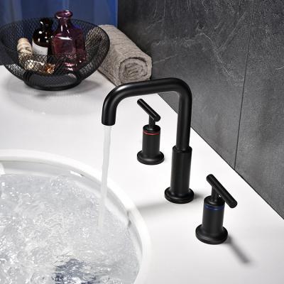 China Modern Black Matte Water Saver Faucet Bathroom Faucet Two Handle 3 Hole Basin Faucet for sale