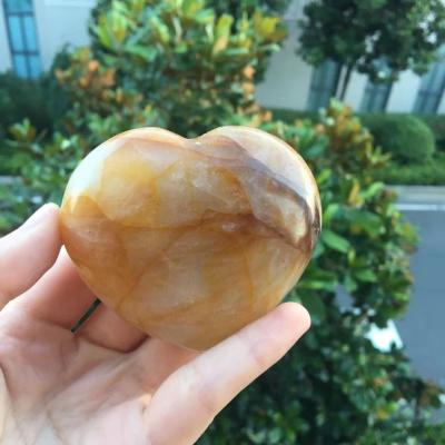 China Wholesale Natural Europe Gemstone Crystal Palm Stone Golden Heart Healer For Ornaments for sale