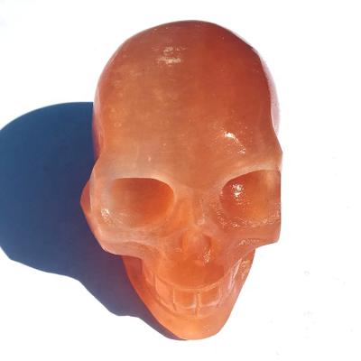 China Crystal Skulls Reiki Healing Gemstone Orange Polish Quartz Europe Selenite Stone Home Decoration for sale