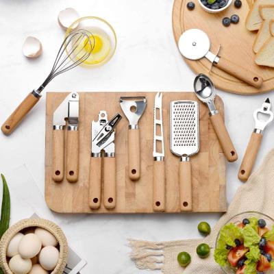 China Viable set of kitchen cookware, stainless steel instrument, spoon, beater, peeler, cutter, grater, can opener, garlic press, corkscrew, knife for sale