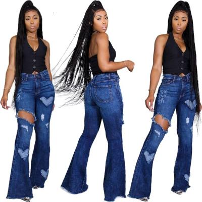 China New Women's Breathable Clothing Casual Fashion Sexy Flared Mid Rise Ripped Jeans Pants for sale