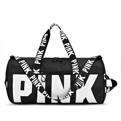 China Waterproof 2021 custom fashionTravel waterproof sports bag printing logo large capacity bag pink duffle ubisex gym bag for sale