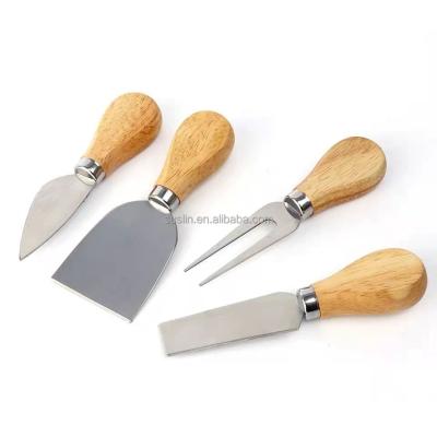 China Sustainable 4pcs Cheese Tools With Handle Stainless Steel Rubber Wooden Cheese Knife Set for sale