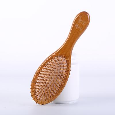 China Massage Hair Detangling Oval Hair Brush Natural Material Eco-Friendly Bamboo Oval Brush Nondisposable for sale