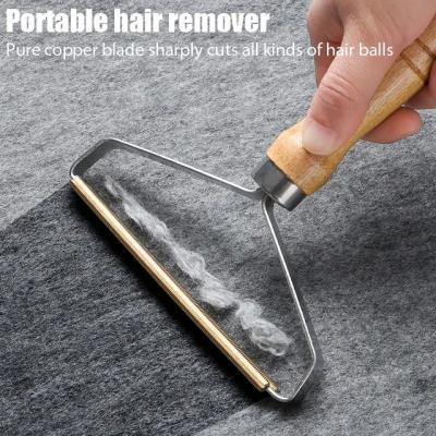China Portable Pet Hair Remover Scraper – Essential Car & Travel Companion for Pet Owners for sale