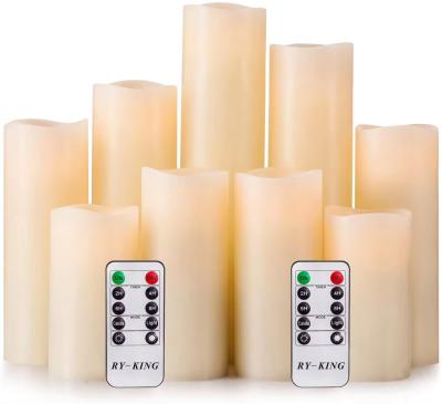 China LED Candle Set Of 9 Remote Control With Battery Operated Real Wax Pillar Flameless Candle for sale