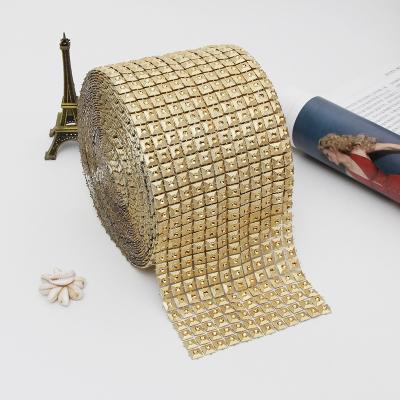 China Durable Wholesale 12 Row Pyramid 10yards Plastic Rhinestone Chain Mesh Garment Accessories For Clothing Diy Parts for sale