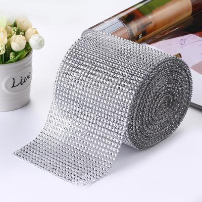 China Durable Wholesale 24 Rows Plastic Hollow Rhinestone Mesh Fabric Multicolour Crystal Ribbon For Clothing Diy Decoration for sale