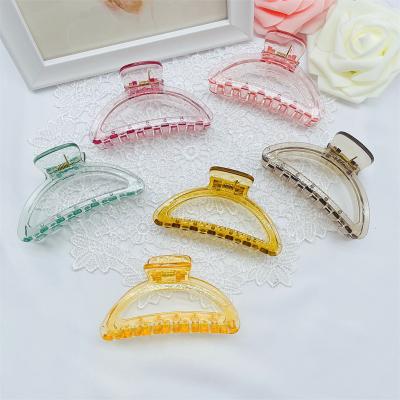 China Fashionable wholesale cheap transparent plastic hair clips claw candy color women hair clips for long hair for sale