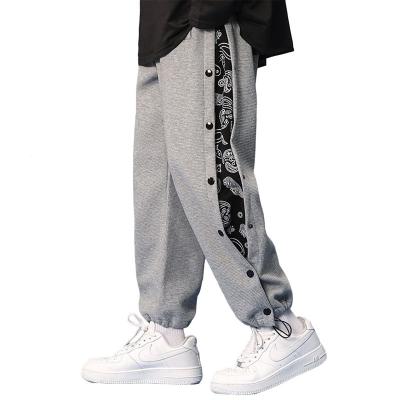 China Anti-wrinkle spring sports pants men's hip pop street loose pants men's waffle paisleys print basketball casual sweatpants for sale