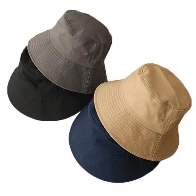 China Summer Striped Bulk Hats Soft Cotton White Fishing Wide Brim Bucket Hat With String for sale