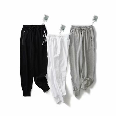 China New Style Anti-Wrinkle Mid Waist Drawstring Casual Pure Color Long Pants Loose Sweat Women Ladies Pants for sale